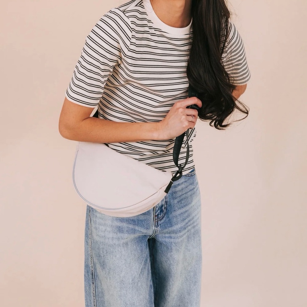 FP MOVEMENT by Free People Bulls Eye Sling Bag Ivory Sporty